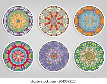 Decorative round ornaments set, isolated elements. Colorful mandala, stylized flower. Abstract geometric doodle patterns for plate decoration, fabric print,  business or greeting card design