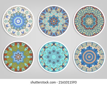 Decorative round ornaments set, isolated elements. Colorful mandala, stylized flower. Abstract geometric doodle patterns for plate decoration, fabric print,  business or greeting card design