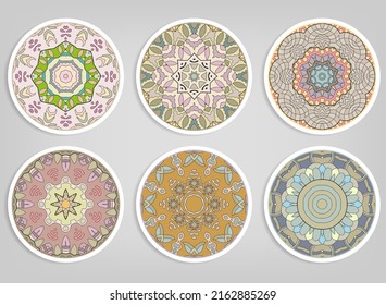 Decorative round ornaments set, isolated elements. Colorful mandala, stylized flower. Abstract geometric doodle patterns for plate decoration, fabric print,  business or greeting card design