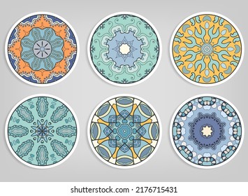 Decorative round ornaments set, isolated elements. Colorful mandala, stylized flower. Abstract geometric doodle patterns for plate decoration, fabric print,  business or greeting card design