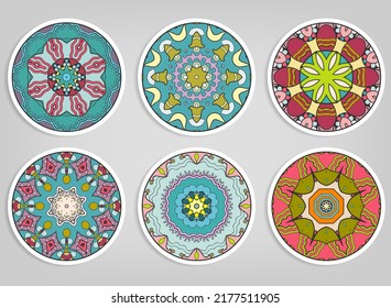 Decorative round ornaments set, isolated elements. Colorful mandala, stylized flower. Abstract geometric doodle patterns for plate decoration, fabric print,  business or greeting card design