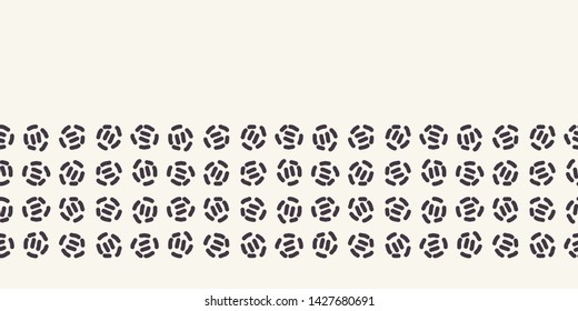 Decorative running stitch embroidery border pattern. Small polka dot circle stripes needlework. Hand drawn textile ribbon trim . Ecru cream home decor. Monochrome simple seamless vector background