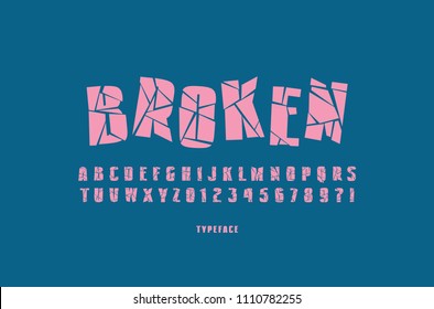 Decorative sans serif font with broken face. Letters and numbers for military, cinema, music logo and title design. Pink typeface on blue background