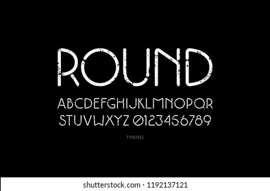 Decorative sans serif font with rounded corners. Letters and numbers with vintage texture. White print on black background