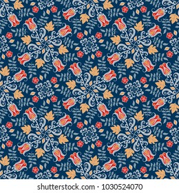 Decorative seamless floral pattern of circular ornaments on a blue backgraund. Folk art.