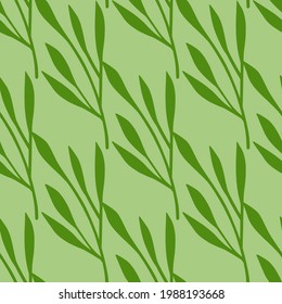 Decorative seamless foliage pattern with green leaf branches silhouettes. Light green background. Vector illustration for seasonal textile prints, fabric, banners, backdrops and wallpapers.
