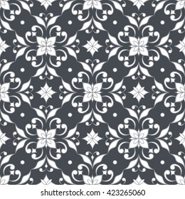 Decorative seamless ornate texture on gray background. Element for design. Ornamental backdrop. Ornate floral decor for wallpaper. Traditional decor on gray background.