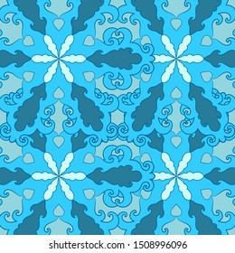 Decorative seamless pattern of blue snowflakes. Ornamental background. Decorative element for surface design.
