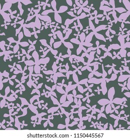 Decorative seamless pattern with chaotic small lilac flowers. Endless floral ornament with violet acosmic flowers on gray backdrop. Stylish background for fabric, wrapping, decoration.