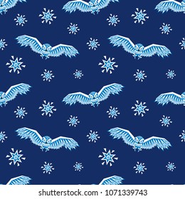 Decorative seamless pattern in ethnic style with owl. Colorful vector background.