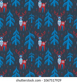 Decorative seamless pattern in folk style with reindeer image. Colorful vector background.