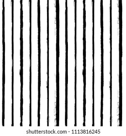 Decorative seamless pattern with hand drawn striped shapes. Hand painted lines grunge ink doodles in black and white colors. vector stripes graphic background. brush strokes, paintbrush backdrop 
