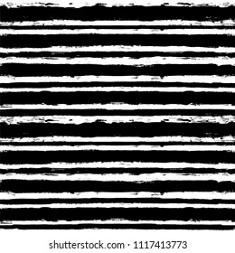 Decorative seamless pattern with hand drawn striped shapes. Hand painted lines grunge ink doodles in black and white colors. vector stripes graphic background. brush strokes, paintbrush backdrop 