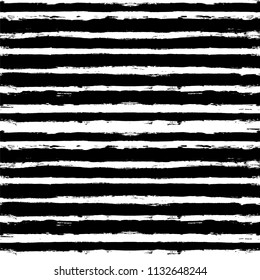 Decorative seamless pattern with hand drawn striped shapes. Hand painted lines grunge ink doodles in black and white colors. vector stripes graphic background. brush strokes, paintbrush backdrop 