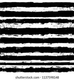 Decorative seamless pattern with hand drawn striped shapes. Hand painted lines grunge ink doodles in black and white colors. vector stripes graphic background. brush strokes, paintbrush backdrop 