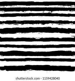 Decorative seamless pattern with hand drawn striped shapes. Hand painted lines grunge ink doodles in black and white colors. vector stripes graphic background. brush strokes, paintbrush backdrop 