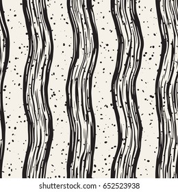 Decorative seamless pattern with hand drawn doodle lines. Hand painted grungy wavy stripes background. Trendy endless freehand texture