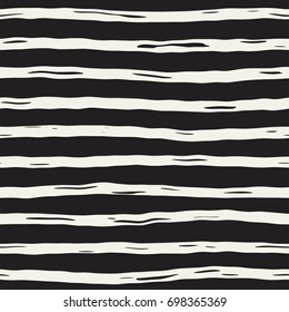 Decorative seamless pattern with hand drawn doodle lines. Hand painted grungy wavy stripes background. Trendy endless freehand texture
