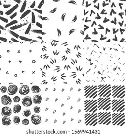 Decorative seamless pattern with handdrawn shapes. Hand painted grungy black ink chalk doodles on white background. Trendy grunge endless texture for digital paper, fabric, backdrops, wrapping