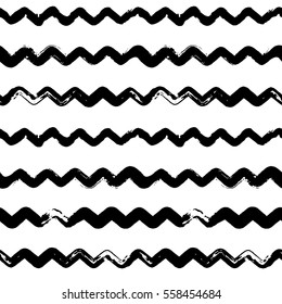 Decorative seamless pattern with handdrawn shapes. Hand painted grungy ink doodles in black and white colors. Trendy endless texture for digital paper, fabric, backdrops, wrapping