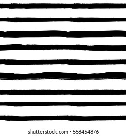 Decorative seamless pattern with handdrawn shapes. Hand painted grungy ink doodles in black and white colors. Trendy endless texture for digital paper, fabric, backdrops, wrapping