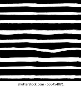 Decorative seamless pattern with handdrawn shapes. Hand painted grungy ink doodles in black and white colors. Trendy endless texture for digital paper, fabric, backdrops, wrapping