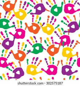 Decorative seamless pattern with a handprints
