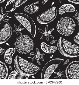 Decorative seamless pattern with ink hand-drawn citrus slices. Vector illustration.