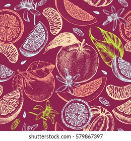 Decorative seamless pattern with ink hand-drawn orange, tangerine and citrus slices. Vector illustration.