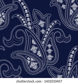 Decorative seamless pattern in oriental ethnic style.Blue  and white paisley motif filigree ornament. Traditional retro indian background. Element for design. 