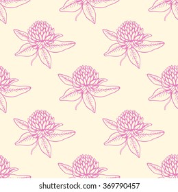 Decorative seamless pattern with pink clover flowers