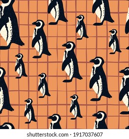 Decorative seamless pattern with random penguin elements print. Orange chequered background. Animal artwork. Graphic design for wrapping paper and fabric textures. Vector Illustration.