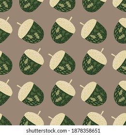 Decorative seamless pattern with simple green acorn silhouettes. Beige background. Stock illustration. Vector design for textile, fabric, giftwrap, wallpapers.