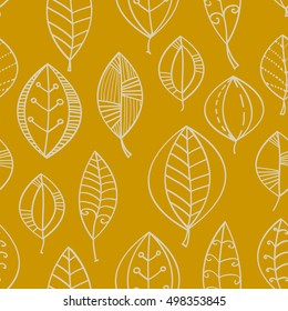 Decorative seamless pattern with yellow leaves. Autumn wallpaper. Yellow abstract autumnal repeating background. Vector fall leaves illustration for textile, wrapping paper, surface textures.