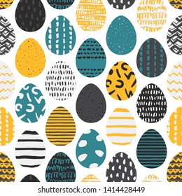 Decorative seamless patterns with hand painted eggs. Colorful endless background with colorful textured ovals on white. Handdrawn stylish backdrop for fabric, wrapping, packaging paper, wallpaper