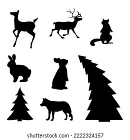 decorative set of silhouettes of animals and Christmas tree, reindeer, wolf, squirrels and rabbits