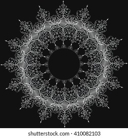 decorative symbol vector lace mandala silver on a black background