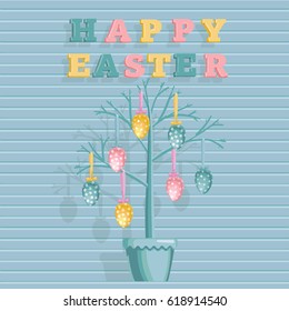 Decorative tree with Easter eggs in a pot and a sign with an inscription of a happy Easter. elements isolated on Blue wall board.
