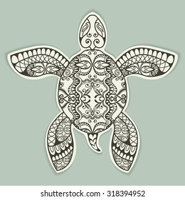 Decorative turtle with ethnic ornament in cut out style with shadow, vector tribal totem animal, isolated element for scrapbook, invitation or greeting card design  svg