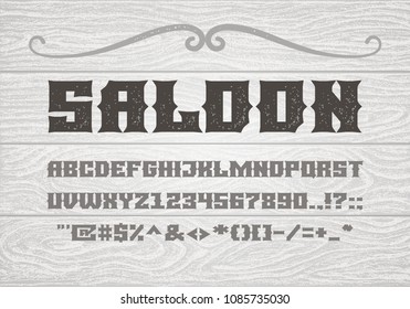 Decorative vintage bold serif font on the background of old white wooden planks. Eps8. RGB Global colors