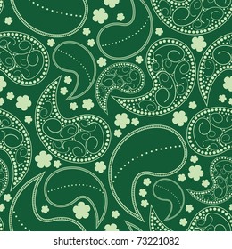 Decorative white elements and flowers on green background - seamless pattern