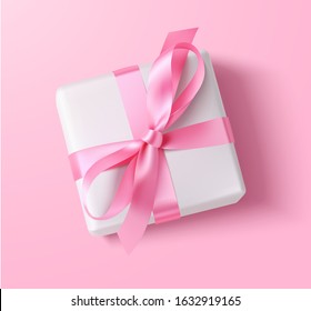 Decorative white gift box with pink bow. Vector illustration. Top view. Flat lay