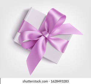 Decorative white gift box with purple bow for holiday decoration. Vector illustration