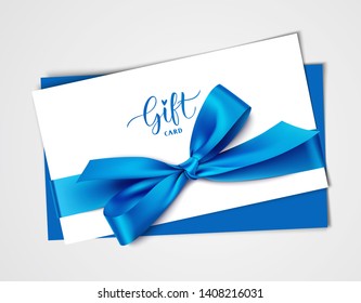 
Decorative white gift card design template with blue bow and ribbon. Vector illustration