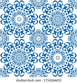 Deep blue color floral motif seamless pattern for tile, wallpaper, textile, bags and bedsheet. Geometric ethnic mandala texture on white background. 