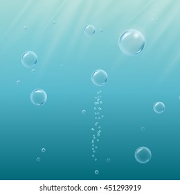 Deep sea with bubbles, sprays and shiny rays underwater. Blue realistic vector EPS10 background.