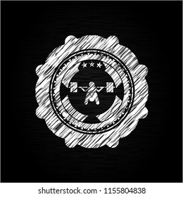 deep squat icon drawn on blackboard