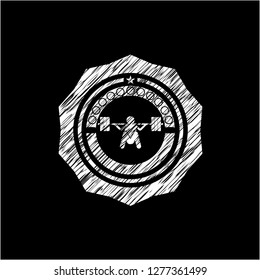 deep squat icon inside chalkboard emblem written on a blackboard