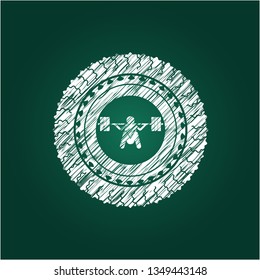 deep squat icon inside chalkboard emblem