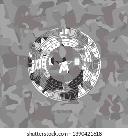deep squat icon inside grey camo texture